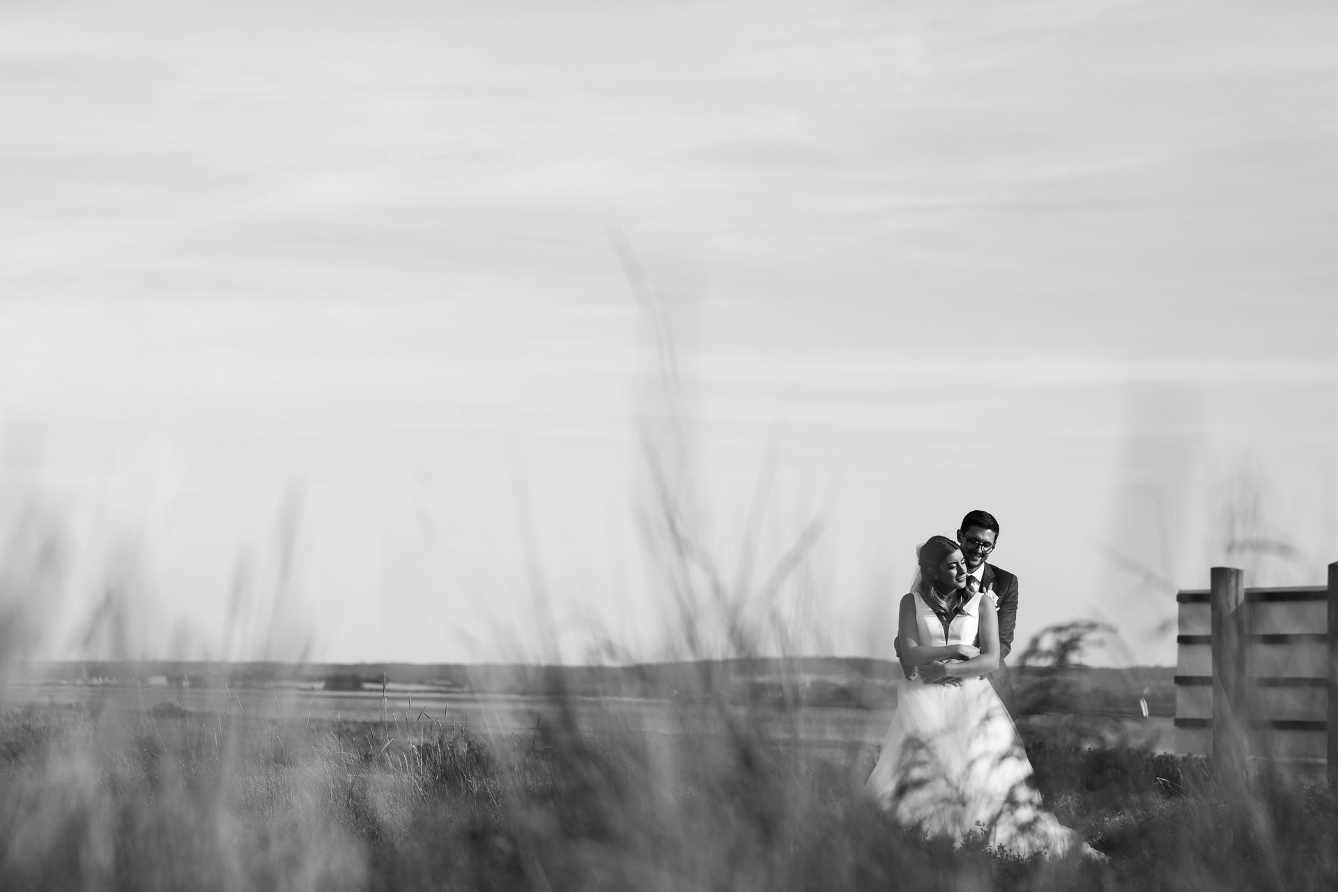 bride and groom at the beach