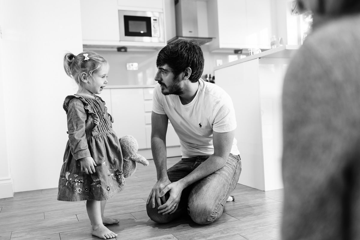 girl and Daddy having a chat