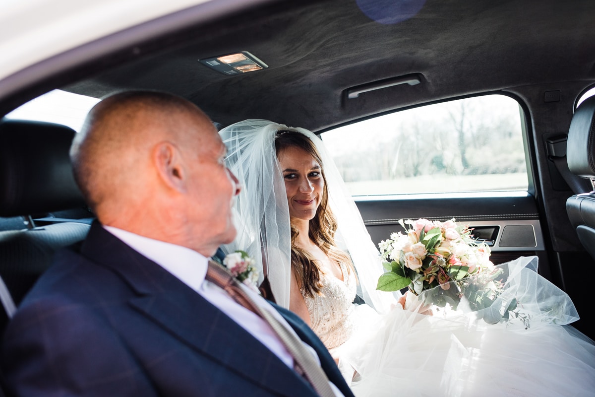 bride and father in wedding car
